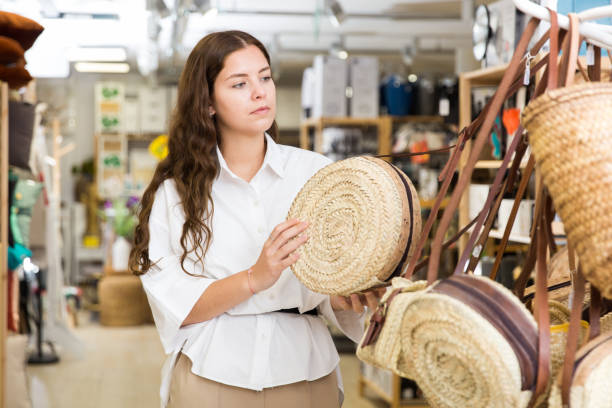 istock Woman buying straw bag at hardware store 1324553485