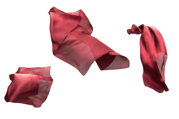 istock Flowing red silk scarf isolated on white background. 1324556226