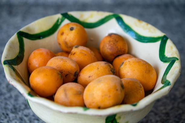 Loquat fruit. Nispero. Loquat in plate.