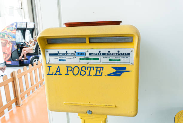 Nice, France - July 09 2008: Yellow french mailbox at Nice airport.