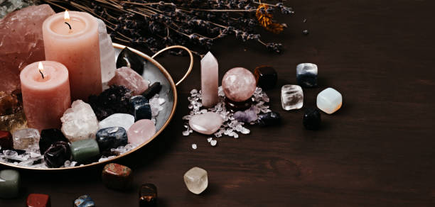 istock Healing chakra crystals therapy. Alternative rituals, gemstones for wellbeing, meditation, destress 1324566035