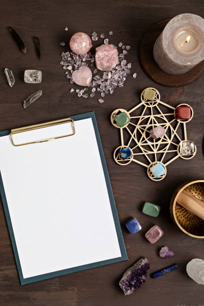 istock Healing chakra crystal grid therapy. Rituals with gemstones and aromatherapy for wellness, healing, meditation 1324566105
