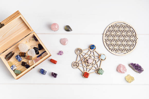 istock Healing chakra crystal grid therapy. Rituals with gemstones and aromatherapy for wellness, healing, meditation 1324566148