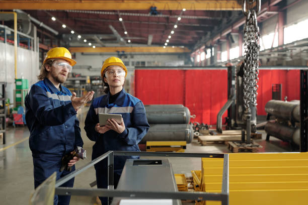 Free Stock Photo of Engineering team working in heavy industrial plant ...