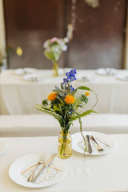 istock Beautiful floral arrangement and table setting at a wedding 1324571643