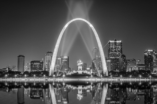 The St. Louis city skyline with Gateway Arch photographed at night.