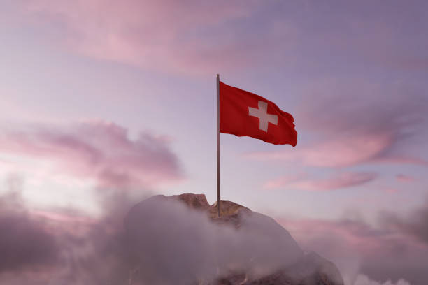 3d rendering of waving Swiss flag on rocky landscape and white clouds stock photo