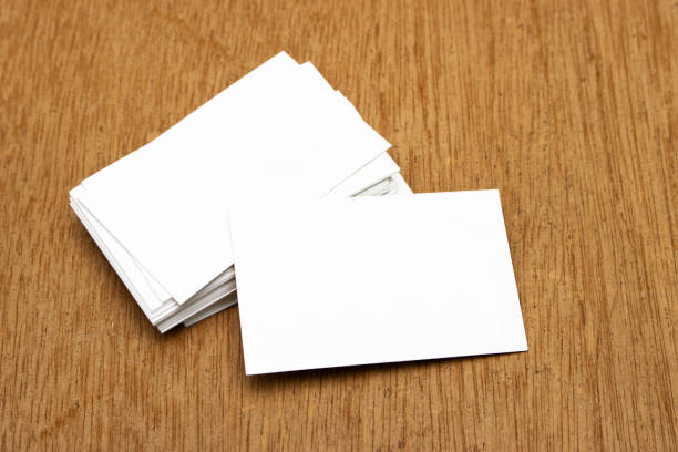 istock white blank visit cards on wood table 1324580510