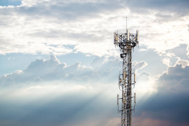 istock Communication tower top. Radio antenna Tower , microwave antenna tower on light sky background. wireless technology concept. communication development concept. image for objects and article. 1324580563