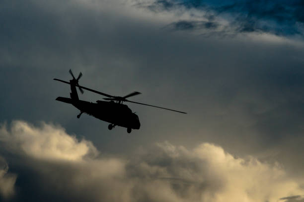 istock military helicopter in flight 1324580890
