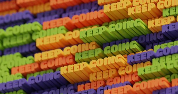istock 3D Keep Going. Abstract typographic 3D lettering background. Modern bright trendy motivational word pattern in neon green, orange, yellow and purple. Contemporary cover and backdrop 1324581940