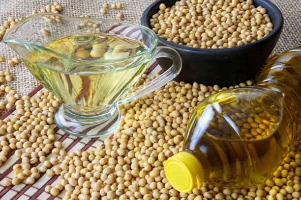 istock soy oil with soy beans on the table 1324584146