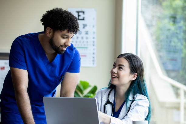 istock Doctor and nurse discussing patient care 1324585208