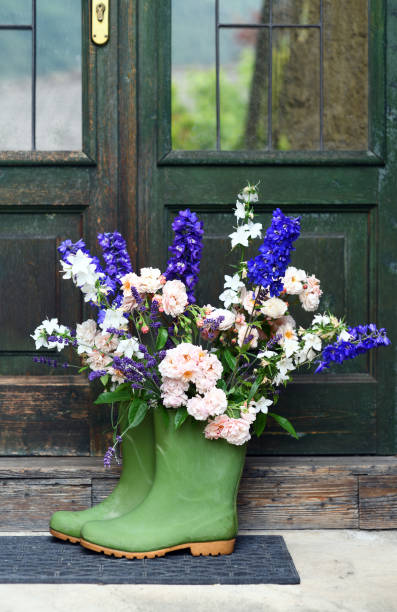 istock Rubber boots with beautiful bouquet 1324585293