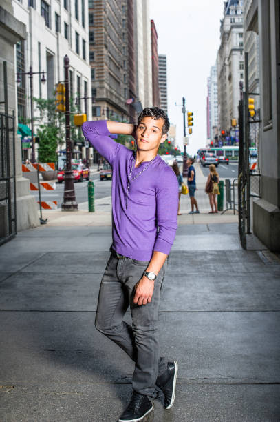 istock Young Man fashionably standing in a gateway 1324589264