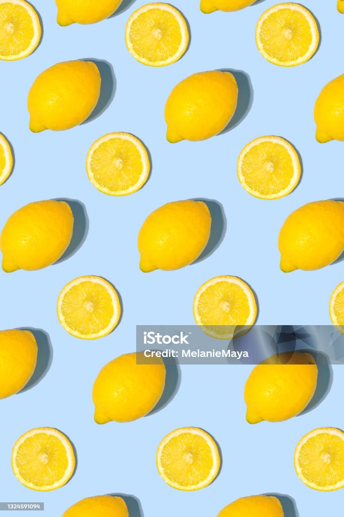Geometrical lemon fruit flatlay modern pattern Geometrical lemon fruit flatlay arranged in modern bright knolling pattern Lemon - Fruit Stock Photo