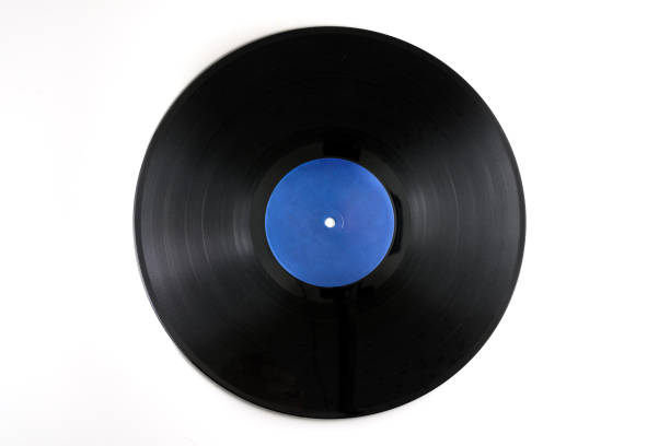istock Old black vinyl records isolated on white 1324592858