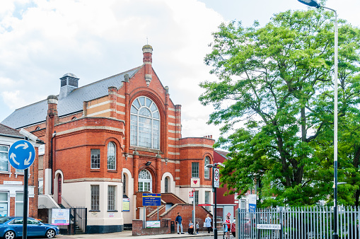 London, United Kingdom, 5 June, 2021: East Ham Baptist Church, built in 1901 designed by Edgar Stones,  is situated in Plashet Grove, East Ham, a mainly residential area of the London Borough of Newham, United Kingdom