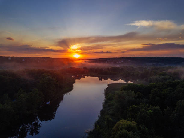 istock Sunset above the river in natural rural landscape 1324593861