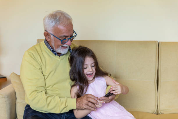 istock A Senior Man is Interested in Learning to Use a Digital Tablet. 1324597050