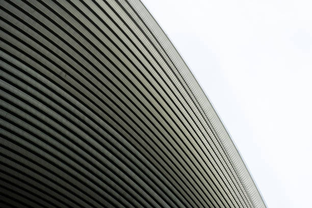 istock contemporary grey metal curve architecture on white background 1324598960