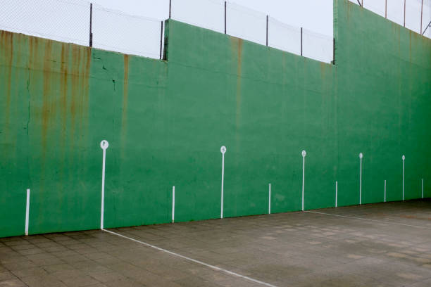 istock green sports ground with a wall 1324603763