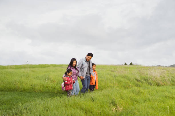 istock Family spending leisure time on hiking tour. 1324606369