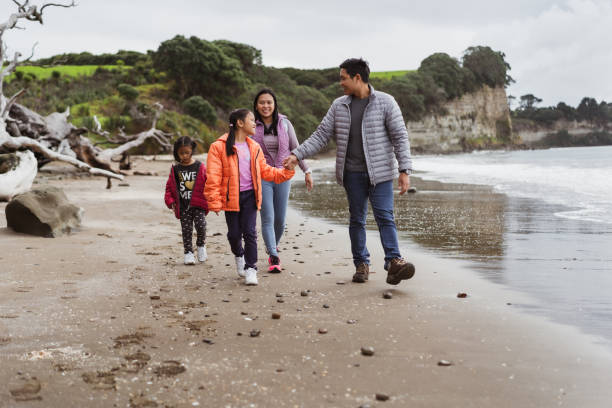 istock Hikers outdoor on the beach. 1324606501
