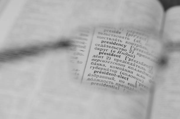 istock Reading glasses and an open book in close-up. Selective Focus on 1324610143