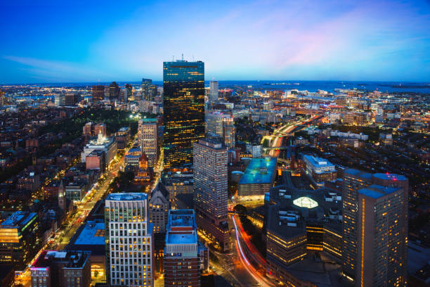 boston cityscape - boston skyline night city imagens e fotografias de stock