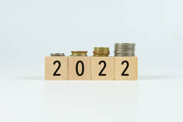 istock 2022 on wooden block with white backgrounds 1324617336