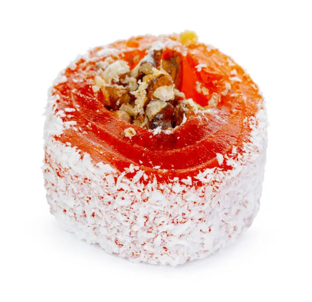 Orange Turkish delight with nuts in powdered sugar isolated on white background