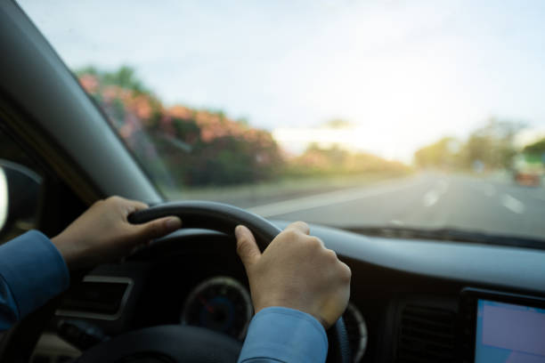 istock Driving car on city street 1324624657