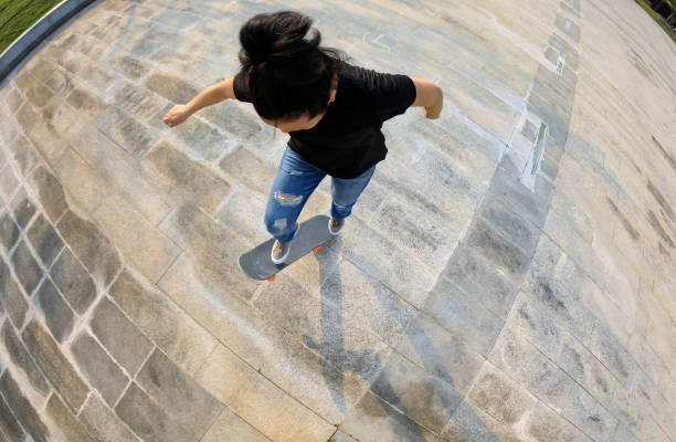 istock Skateboarder skateboarding outdoors in the morning 1324624717