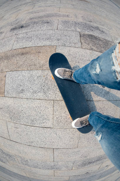 istock Skateboarder legs skateboarding at outdoors 1324626171