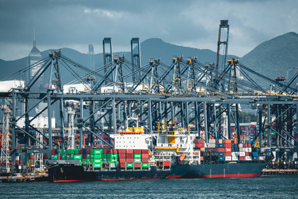 istock View on Cargo crane container terminal in Hong Kong 1324628052