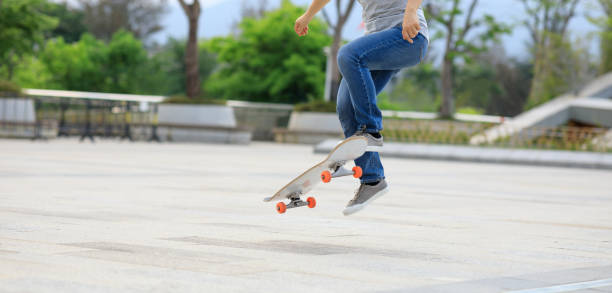istock Skateboarder legs skateboarding at outdoors 1324628329