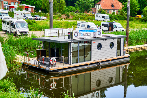 Houseboat for rent in the harbor for use as a vacation home waiting for vacationers in Lauenburg, Germany, June 8., 2021