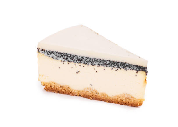 A piece of vanilla cheesecake with poppy seeds.