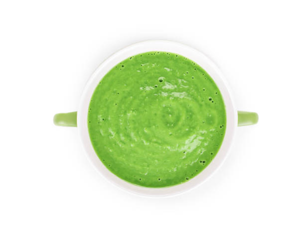 istock Green cream soup in a bowl. 1324631178
