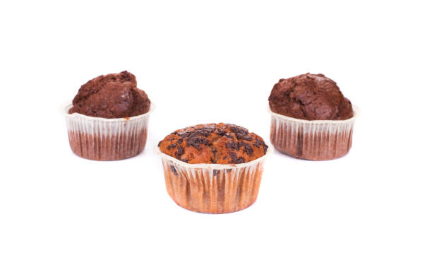 istock Two chocolate muffins and one muffin with chocolate chips. 1324631389