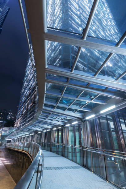 istock Night scene of empty modern pedestrian walkway in downtown 1324635190