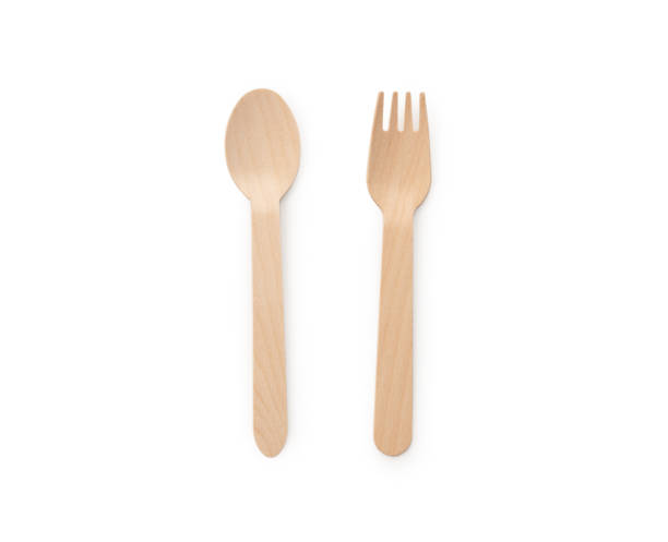istock Wood paper spoon with fork on isolated white background 1324637576