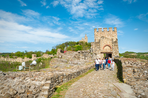 Veliko Tarnovo, Bulgaria - 30 april, 2021: Tourists in Tsarevets fortress, Vekiko Tarnovo. Bulgaria, Europe.