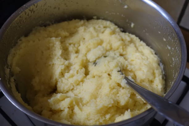 istock Polenta with wheat semolina and grated gruyere being cooked in a pan 1324644321