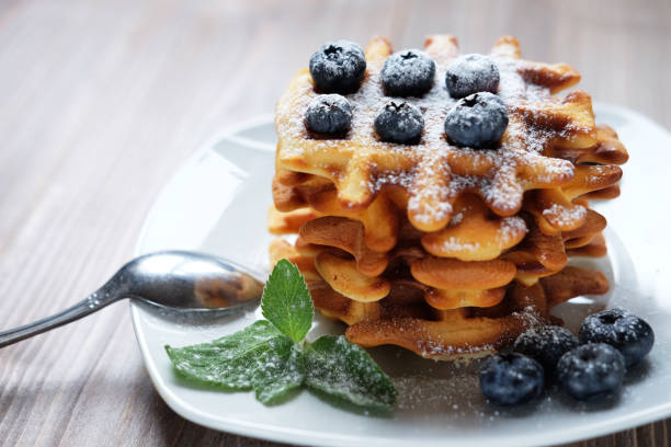istock Homemade Belgian waffles served with fresh berries 1324644378
