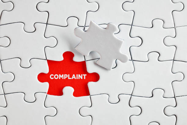 istock The word complaint on the missing puzzle piece. To discover or expose customer complaints 1324647176