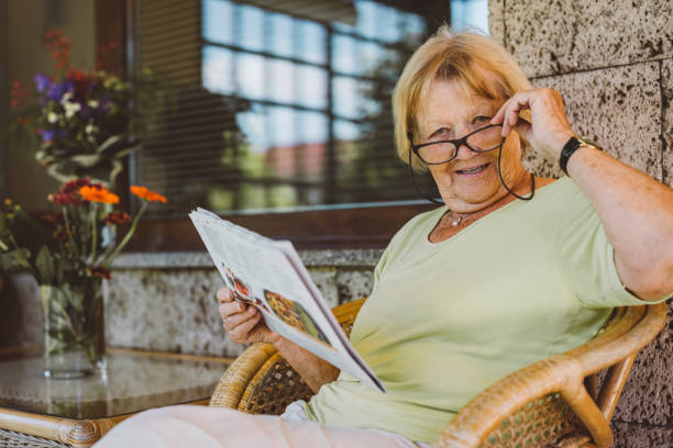 istock Happy elderly woman relaxing in the afternoon 1324650136