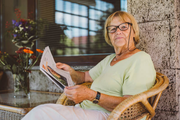 istock Happy elderly woman relaxing in the afternoon 1324650142