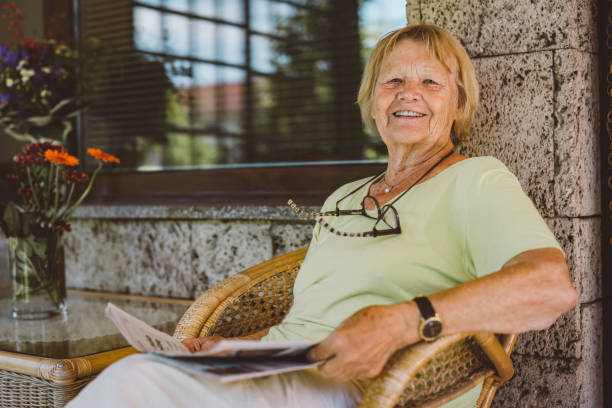 istock Happy elderly woman relaxing in the afternoon 1324650146